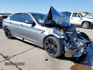 2018 BMW M5 z VIN WBSJF0C50JB282469, wystawiony jako Copart lot #46794335 z przebiegiem Nie podano mil oraz Szkody całkowita. Historia ofert i sprzedaży dostępna na DreamBid. Obrazek 4.