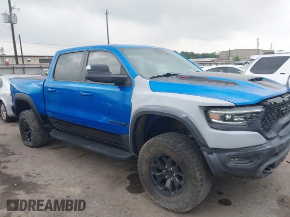 2021 Ram 1500 TRX with VIN 1C6SRFU91MN790158, listed as a IAAI auction lot 42115253 with 30,969 mi miles and . Bid and sale history available at DreamBid. Image 1.