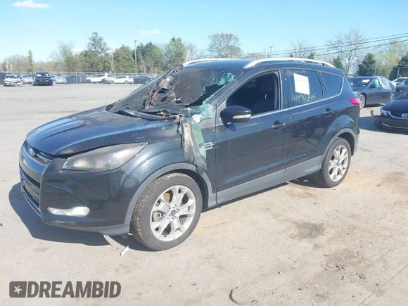 2015 Ford Escape Titanium with VIN 1FMCU9J94FUC33962, listed as a IAAI auction lot 41990795 with Not provided miles and . Bid and sale history available at DreamBid. Image 2.