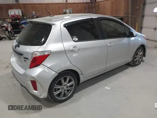 2012 Toyota Yaris L with VIN JTDKTUD31CD511550, listed as a IAAI auction lot 42157934 with 131,183 mi miles. Bid and sale history available at carsss.com. Image 4.