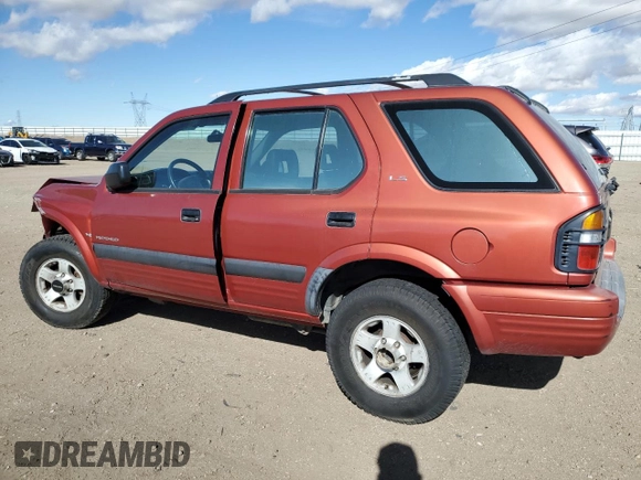 1999 Isuzu Rodeo S with VIN 4S2CM58WXX4318576, listed as a Copart auction lot 44378265 with 258,981 mi miles and Salvage Title. Bid and sale history available at DreamBid. Image 2.