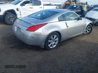2004 Nissan 350Z Touring with VIN JN1AZ34E94T052137, listed as a IAAI auction lot 41939712 with 93,426 mi miles. Bid and sale history available at carsss.com. Image 4.