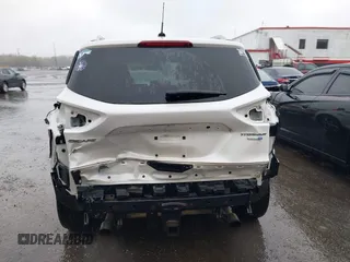 2014 Ford Escape Titanium with VIN 1FMCU9J94EUD49614, listed as a IAAI auction lot 42005864 with 87,779 mi miles. Bid and sale history available at carsss.com. Image 16.
