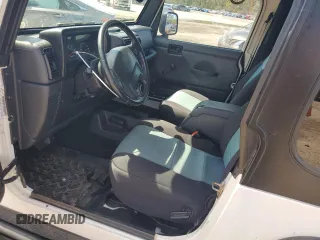 2003 Jeep Wrangler Rubicon z VIN 1J4FA69S73P333199, wystawiony jako Copart lot #50602615 z przebiegiem 133 254 mil mil oraz Szkoda całkowita • Salvage title. Historia ofert i sprzedaży dostępna na DreamBid. Obrazek 7.