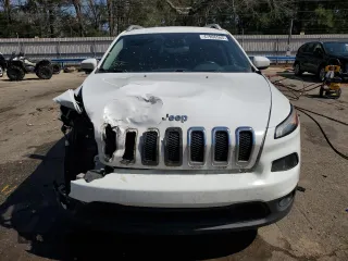 2016 Jeep Cherokee Altitude with VIN 1C4PJLCB9GW209643, listed as a Copart auction lot 47996565 with 167,005 mi miles and Salvage Title. Bid and sale history available at carsss.com. Image 5.