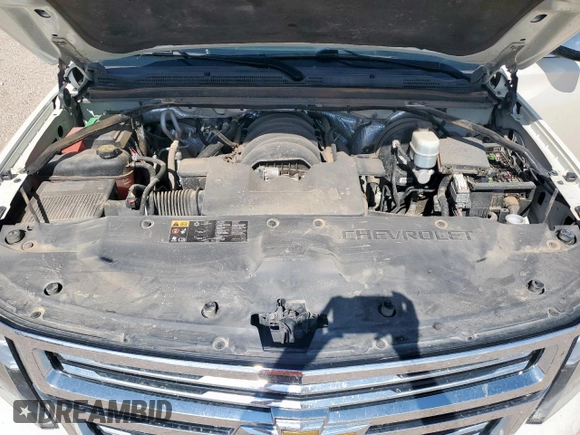 2015 Chevrolet Suburban LTZ with VIN 1GNSCKKC6FR705660, listed as a Copart auction lot 60328685 with 174,247 mi miles and Salvage title. Bid and sale history available at DreamBid. Image 12.