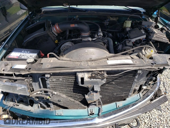 1998 Chevrolet Tahoe z VIN 1GNEK13R2WJ304666, wystawiony jako Copart lot #57833815 z przebiegiem 199 103 mil mil oraz Szkoda całkowita • Salvage title. Historia ofert i sprzedaży dostępna na DreamBid. Obrazek 12.