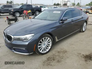 2016 BMW 7 Series 740i with VIN WBA7E2C51GG546677, listed as a Copart auction lot 63455445 with 106,553 mi miles and Salvage title. Bid and sale history available at DreamBid. Image 1.