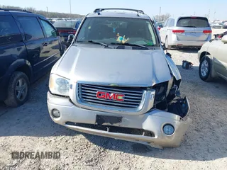 2005 GMC Envoy SLE with VIN 1GKDT13S952256293, listed as a IAAI auction lot 42048366 with 225,753 mi miles and . Bid and sale history available at DreamBid. Image 6.