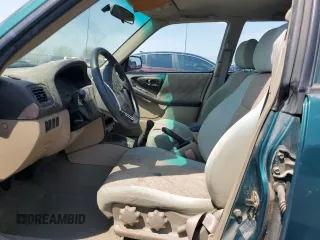 1999 Subaru Forester L with VIN JF1SF6350XG745369, listed as a Copart auction lot 64697045 with 42,522 mi miles and Clean title. Bid and sale history available at DreamBid. Image 7.