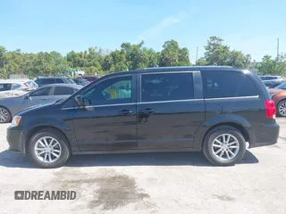 2019 Dodge Grand Caravan SXT with VIN 2C4RDGCG5KR739144, listed as a IAAI auction lot 42175888 with 43,577 mi miles and . Bid and sale history available at DreamBid. Image 14.