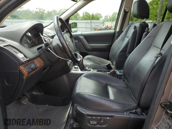 2010 Land Rover LR2 HSE with VIN SALFR2BN5AH191866, listed as a Copart auction lot 60617335 with 154,409 mi miles and Salvage title. Bid and sale history available at DreamBid. Image 7.