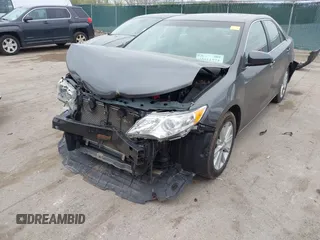 2014 Toyota Camry L with VIN 4T4BF1FK6ER364253, listed as a IAAI auction lot 42011773 with 87,051 mi miles. Bid and sale history available at carsss.com. Image 6.
