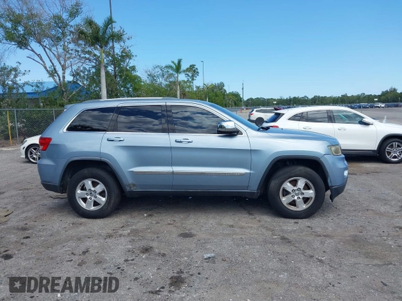 2013 Jeep Grand Cherokee Laredo with VIN 1C4RJEAG2DC517303, listed as a IAAI auction lot 42040405 with 222,952 mi miles. Bid and sale history available at carsss.com. Image 13.