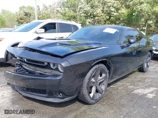 2015 Dodge Challenger SXT Plus with VIN 2C3CDZBG3FH724659, listed as a IAAI auction lot 41991083 with 148,984 mi miles. Bid and sale history available at carsss.com. Image 2.