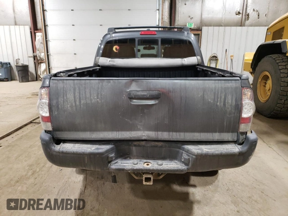 2009 Toyota Tacoma z VIN 3TMLU42N79M027000, wystawiony jako Copart lot #58371365 z przebiegiem 168 989 mil mil oraz Szkoda całkowita • Salvage title. Historia ofert i sprzedaży dostępna na DreamBid. Obrazek 6.