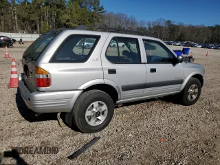 1999 Isuzu Rodeo S with VIN 4S2CK58W7X4357910, listed as a Copart auction lot 86955254 with 105,593 mi miles and Salvage Title. Bid and sale history available at DreamBid. Image 3.