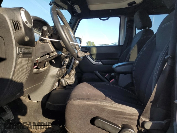 2013 Jeep Wrangler Unlimited Rubicon with VIN 1C4BJWFGXDL556365, listed as a Copart auction lot 88906315 with 113,880 mi miles and Salvage Title. Bid and sale history available at carsss.com. Image 7.