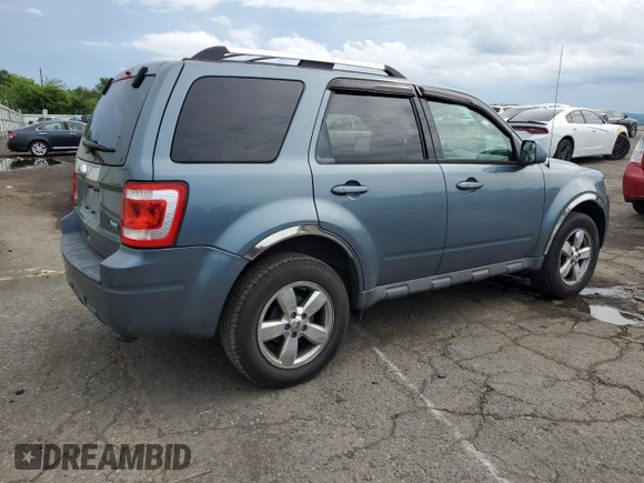 2010 Ford Escape Limited with VIN 1FMCU9EG1AKC28781, listed as a Copart auction lot 61601725 with 99,969 mi miles and Salvage title. Bid and sale history available at DreamBid. Image 3.