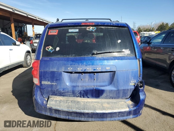 2019 Dodge Grand Caravan SXT with VIN 2C4RDGCG0KR699507, listed as a Copart auction lot 47245015 with 100,034 mi miles and Salvage Title. Bid and sale history available at carsss.com. Image 6.
