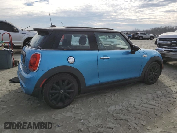 2018 MINI Hardtop Cooper S with VIN WMWXP7C5XJ2A48590, listed as a Copart auction lot 86309584 with 56,643 mi miles and Salvage Title. Bid and sale history available at DreamBid. Image 3.
