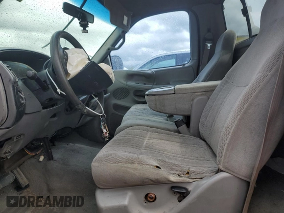 1998 Ford F-150 with VIN 1FTZF18W8WKC34713, listed as a Copart auction lot 50933355 with 237,940 mi miles and Salvage title. Bid and sale history available at DreamBid. Image 7.