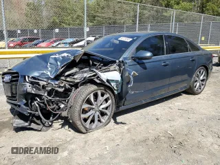 2014 Audi A6 3.0T Prestige with VIN WAUHGAFCXEN115962, listed as a Copart auction lot 52228395 with 134,622 mi miles and Salvage Title. Bid and sale history available at carsss.com. Image 1.