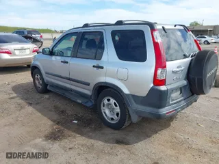 2005 Honda CR-V LX with VIN JHLRD68565C015724, listed as a IAAI auction lot 42021737 with 207,142 mi miles. Bid and sale history available at carsss.com. Image 3.