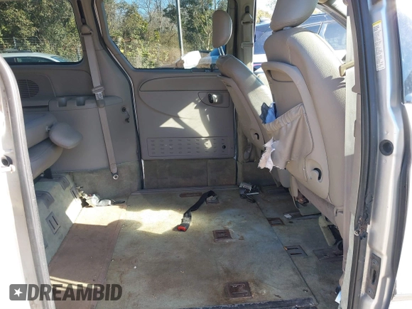 2003 Chrysler Town & Country EX with VIN 2C4GP74L83R212596, listed as a IAAI auction lot 41335410 with Not Provided miles and . Bid and sale history available at carsss.com. Image 8.