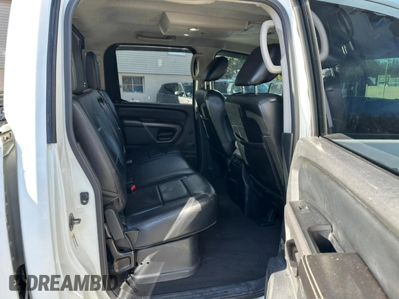 2015 Nissan Titan SL with VIN 1N6BA0EC7FN509763, listed as a Copart auction lot 88064785 with 168,916 mi miles and Clean Title. Bid and sale history available at carsss.com. Image 9.