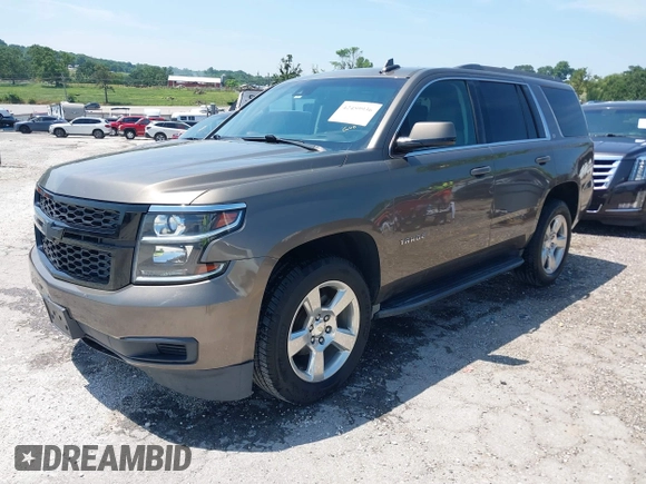 2016 Chevrolet Tahoe LT z VIN 1GNSCBKC8GR210829, wystawiony jako IAAI lot #42459936 z przebiegiem 160 518 mil mil oraz . Historia ofert i sprzedaży dostępna na DreamBid. Obrazek 19.