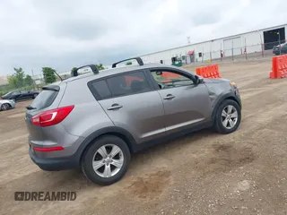 2013 Kia Sportage LX with VIN KNDPBCA29D7495287, listed as a IAAI auction lot 42537122 with 221,052 mi miles and . Bid and sale history available at DreamBid. Image 4.