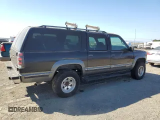 1999 Chevrolet Suburban with VIN 1GNGK26R5XJ513945, listed as a Copart auction lot 73673314 with 198,656 mi miles and Clean Title. Bid and sale history available at carsss.com. Image 3.