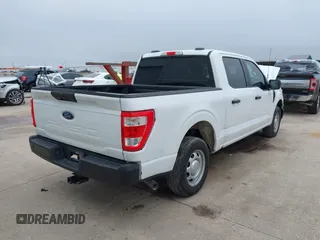 2023 Ford F-150 XL with VIN 1FTEW1C5XPKF56011, listed as a IAAI auction lot 40909405 with Not provided miles and . Bid and sale history available at DreamBid. Image 4.
