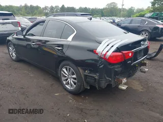 2014 Infiniti Q50 Premium z VIN JN1BV7AR4EM695232, wystawiony jako IAAI lot #42367581 z przebiegiem 138 063 mil mil oraz . Historia ofert i sprzedaży dostępna na DreamBid. Obrazek 3.