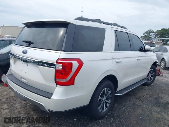 2018 Ford Expedition XLT with VIN 1FMJU1HT9JEA48285, listed as a IAAI auction lot 40282104 with 79,476 mi miles. Bid and sale history available at carsss.com. Image 4.