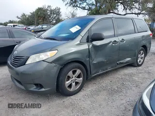 2014 Toyota Sienna L with VIN 5TDZK3DC6ES421278, listed as a IAAI auction lot 41178679 with 202,823 mi miles. Bid and sale history available at carsss.com. Image 22.