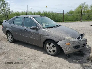 2007 Ford Focus S z VIN 1FAHP34N17W103625, wystawiony jako Copart lot #55300395 z przebiegiem 82 041 mil mil oraz Szkoda całkowita • Salvage title. Historia ofert i sprzedaży dostępna na DreamBid. Obrazek 4.