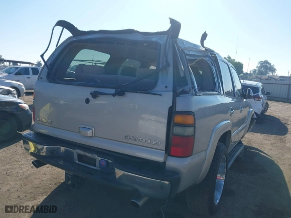 2004 Chevrolet Tahoe LS with VIN 1GNEC13T64J282970, listed as a IAAI auction lot 41879458 with 205,952 mi miles. Bid and sale history available at carsss.com. Image 4.