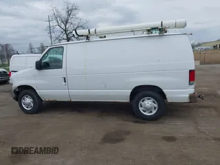 2013 Ford Econoline Cargo Commercial with VIN 1FTNE2EW9DDA82065, listed as a IAAI auction lot 42073299 with 259,758 mi miles and . Bid and sale history available at DreamBid. Image 14.