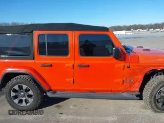 2018 Jeep Wrangler Unlimited Sahara with VIN 1C4HJXEN1JW198258, listed as a IAAI auction lot 41440346 with 44,469 mi miles and . Bid and sale history available at DreamBid. Image 14.
