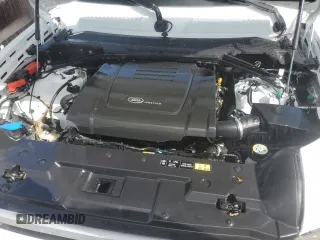 2024 Land Rover Defender S with VIN SALEJ7EX0R2341653, listed as a Copart auction lot 77228254 with Not provided miles and Salvage title. Bid and sale history available at DreamBid. Image 12.