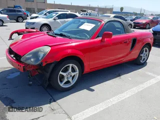 2000 Toyota MR2 z VIN JTDFR3207Y0021485, wystawiony jako IAAI lot #42281031 z przebiegiem 133 064 mil mil oraz . Historia ofert i sprzedaży dostępna na DreamBid. Obrazek 2.