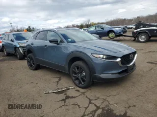 2023 Mazda CX-30 S Carbon Edition with VIN 3MVDMBCM7PM569904, listed as a Copart auction lot 52280755 with 18,963 mi miles and Salvage title. Bid and sale history available at DreamBid. Image 4.