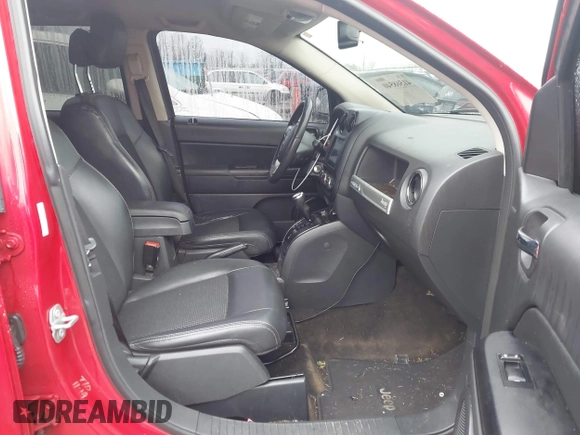 2016 Jeep Compass Sport z VIN 1C4NJCBA1GD703278, wystawiony jako IAAI lot #41568540 z przebiegiem 142 514 mil mil oraz . Historia ofert i sprzedaży dostępna na DreamBid. Obrazek 5.
