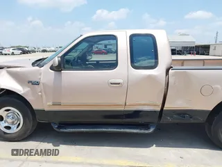 1997 Ford F-150 with VIN 1FTDX1769VNB04591, listed as a IAAI auction lot 42318471 with 202,860 mi miles and . Bid and sale history available at DreamBid. Image 14.