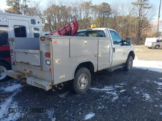 2011 Ford F-350 with VIN 1FDBF3BT8BEC95754, listed as a IAAI auction lot 41275804 with 159,477 mi miles and . Bid and sale history available at DreamBid. Image 4.