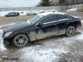 2015 Mercedes-Benz E-Class E 400 with VIN WDDKJ6HBXFF298843, listed as a Copart auction lot 87126014 with 164,113 mi miles and Clean Title. Bid and sale history available at carsss.com. Image 1.