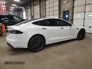 2023 Tesla Model S с VIN 5YJSA1E5XPF520265, выставлен на аукционе Copart как лот 54833255 с пробегом 16 502 миль миль и Списание • Salvage title. История ставок и продаж доступна на DreamBid. Изображение 3.