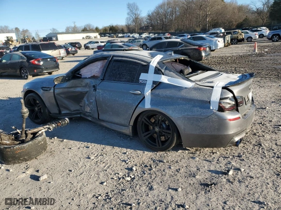 2014 BMW M5 with VIN WBSFV9C57ED593159, listed as a Copart auction lot 87475634 with 0 mi miles and Salvage Title. Bid and sale history available at carsss.com. Image 2.
